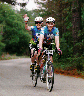 Two people on a bicycle